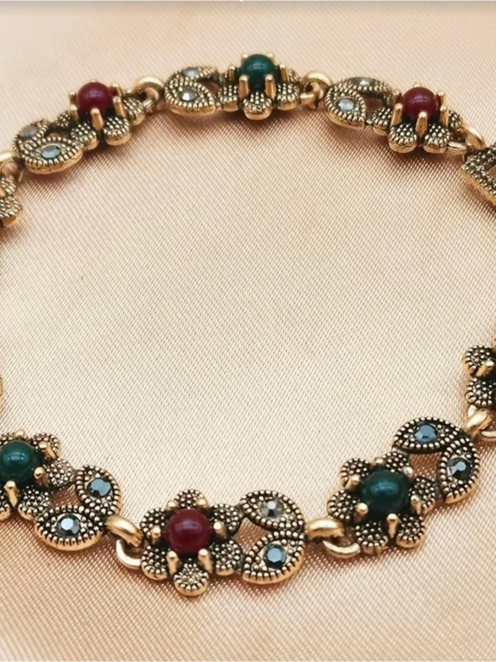 Vintage-Style Rose Gold Bracelet with Red and Green Beads